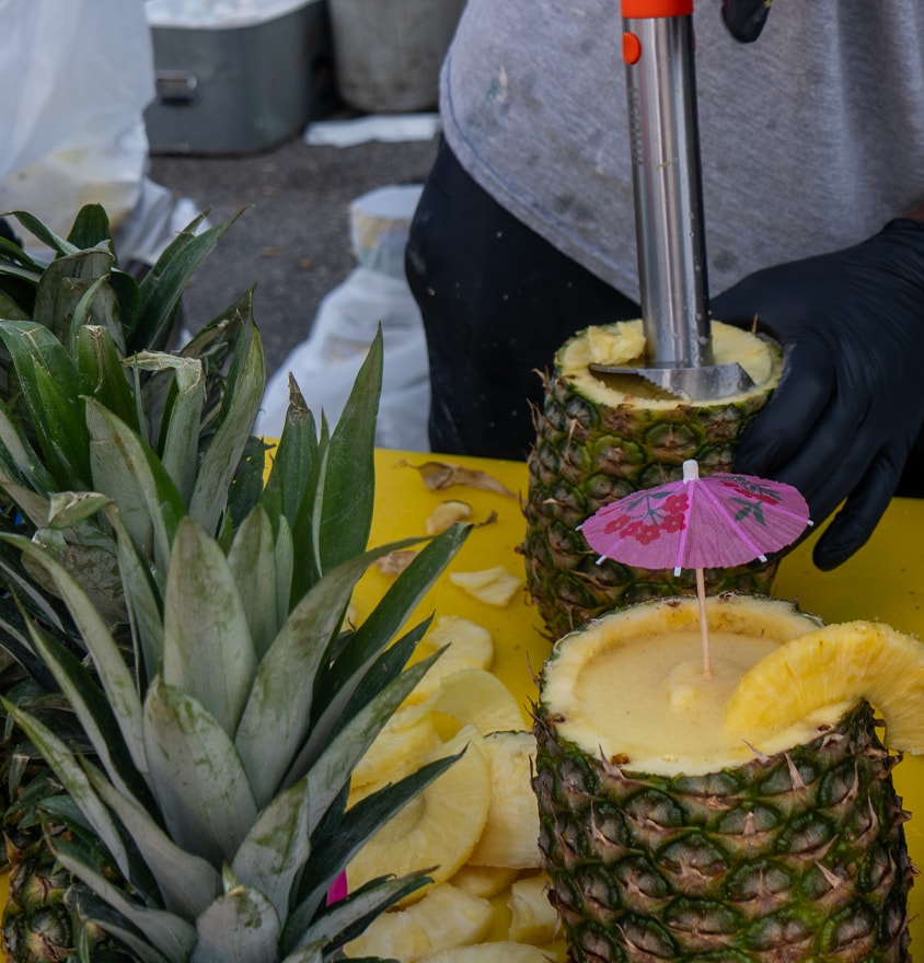 Pineapple cocktails with decorative umbrellas